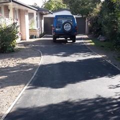 Completed asphalt driveway by Pidgeon Contracting